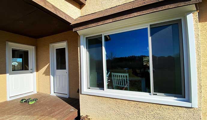 Classic white slider window installed in a house